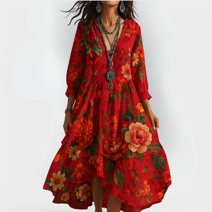 Flowing women's floral tiered maxi dress with long sleeves & V-neck, ideal for summer or fall occasion wear.