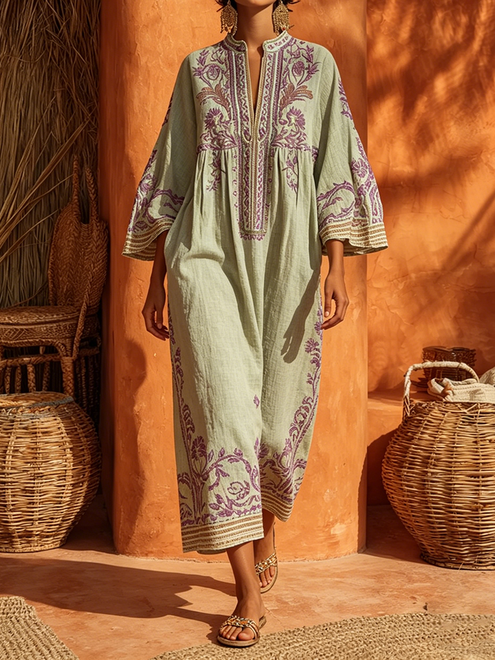 Women's floral boho maxi dress with long sleeves & mandarin collar, elegant & relaxed fit, perfect summer wear.