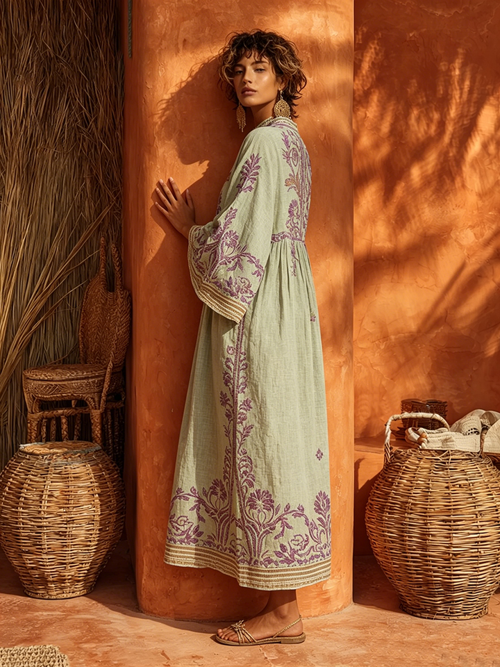 Bohemian embroidered long sleeve maxi dress for women, empire waist, casual & stylish floral summer attire.