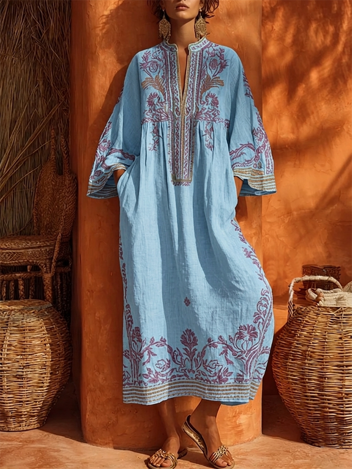 Women's empire waist boho maxi dress, floral pattern, long sleeves, mandarin collar for a chic look.