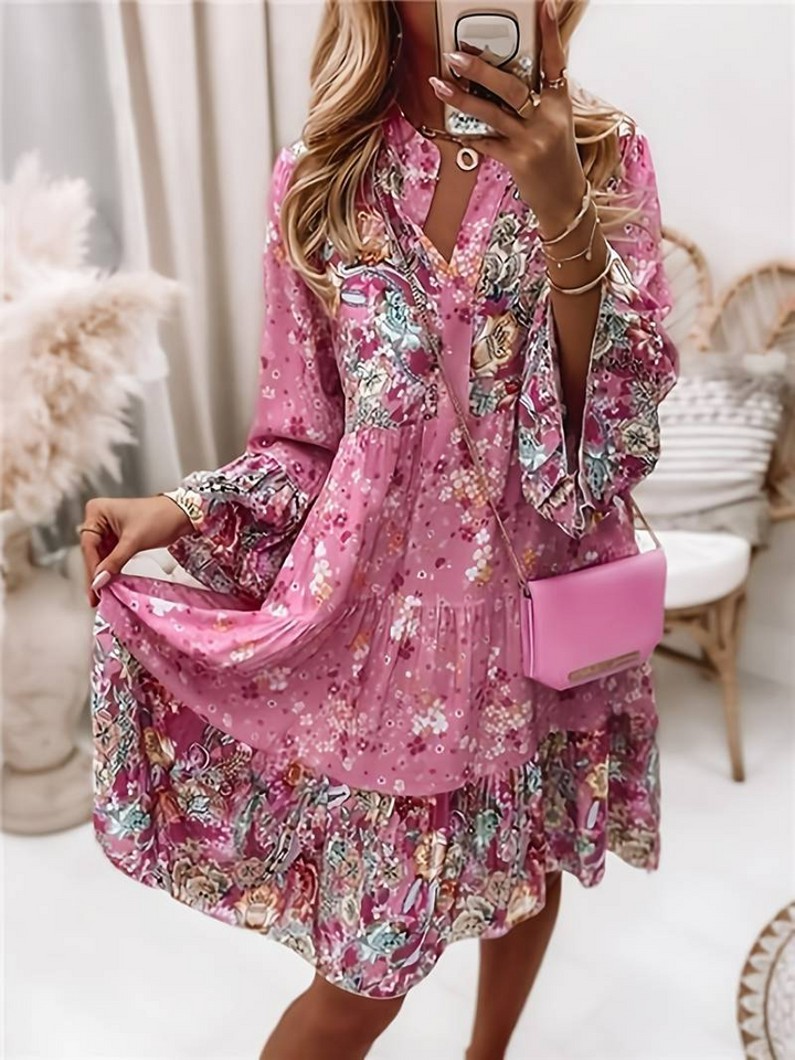Women's floral boho mini dress, perfect for stylish and comfortable summer wear or vacation.