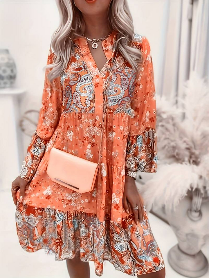 Comfortable women's floral boho mini dress, a stylish choice for warm summer days and casual wear.