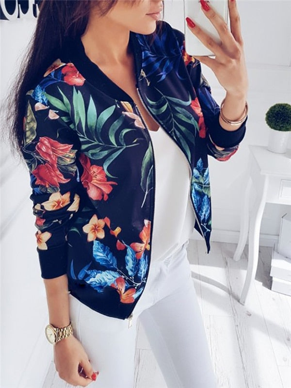 Comfortable women's floral print bomber jacket with a zip front. Lightweight, casual layer for stylish spring looks.