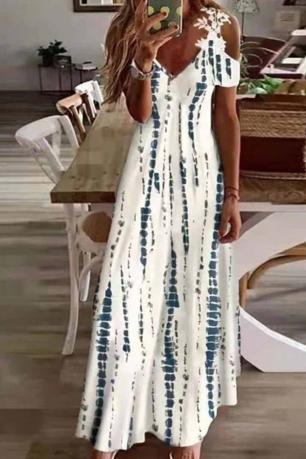 Stylish women's floral cold shoulder summer maxi dress, V-neck for casual or elegant looks.