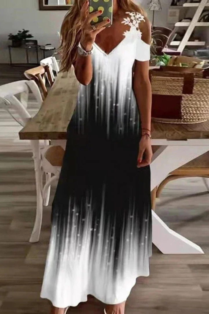 Elegant women's floral cold shoulder maxi dress, great for summer parties or casual outings.