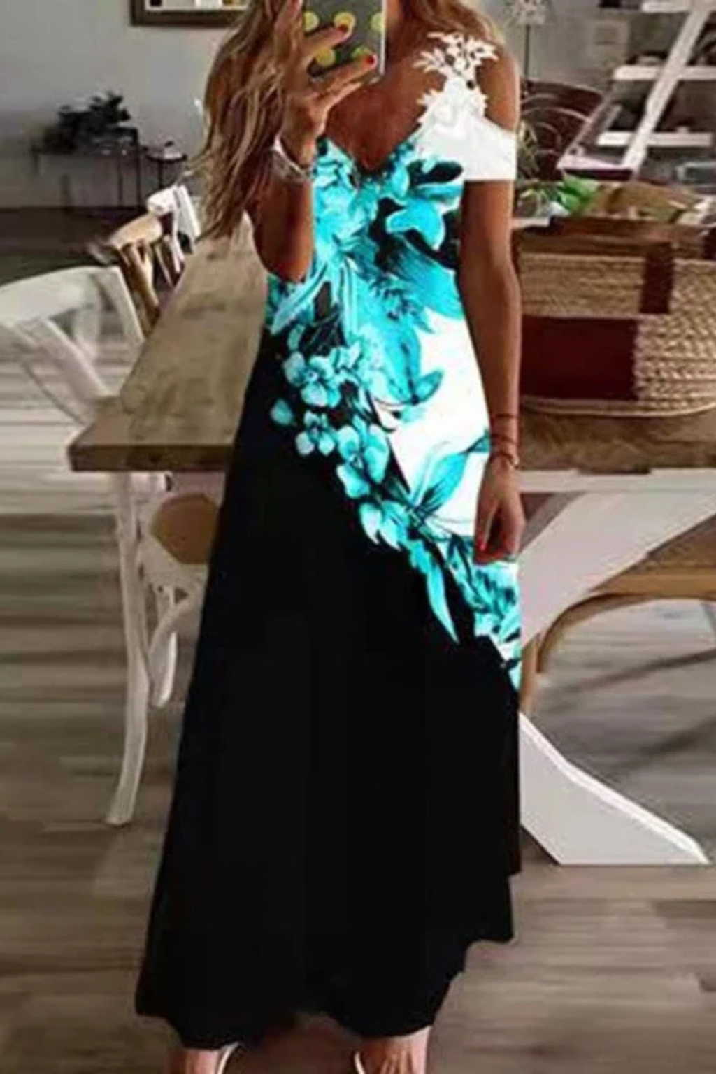 Flowy women's cold shoulder maxi dress with beautiful floral design, perfect for summer.