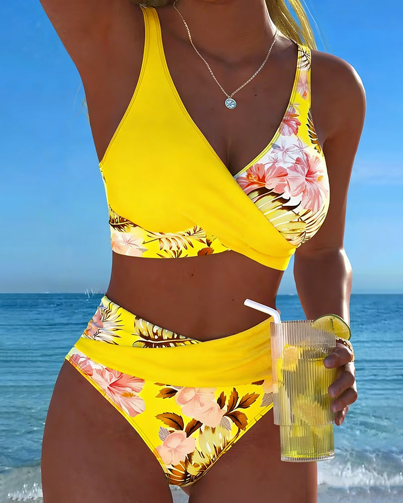 Elegant floral cut-out high-waisted bikini set for women, combining comfort with a modern beachwear style.