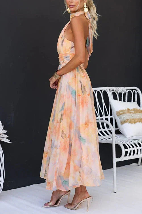 Beautiful women's floral halter neck maxi sundress, an A-line summer dress perfect for beach, vacation, or casual elegance.