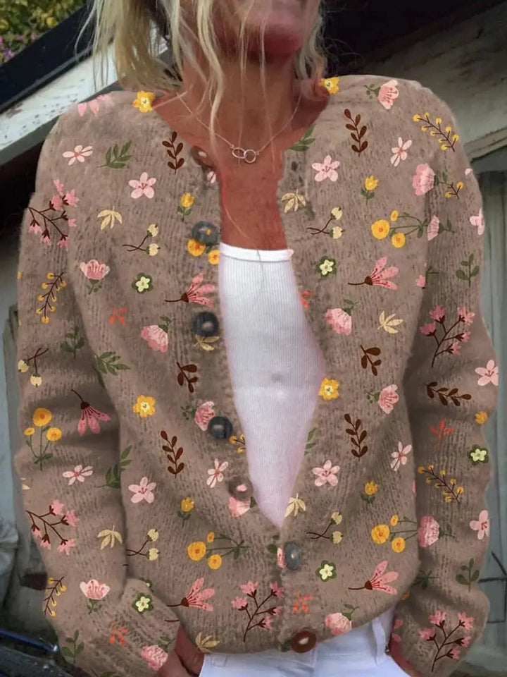 Relaxed fit women's floral button-up cardigan vest. Perfect for casual spring outerwear & comfortable layering.