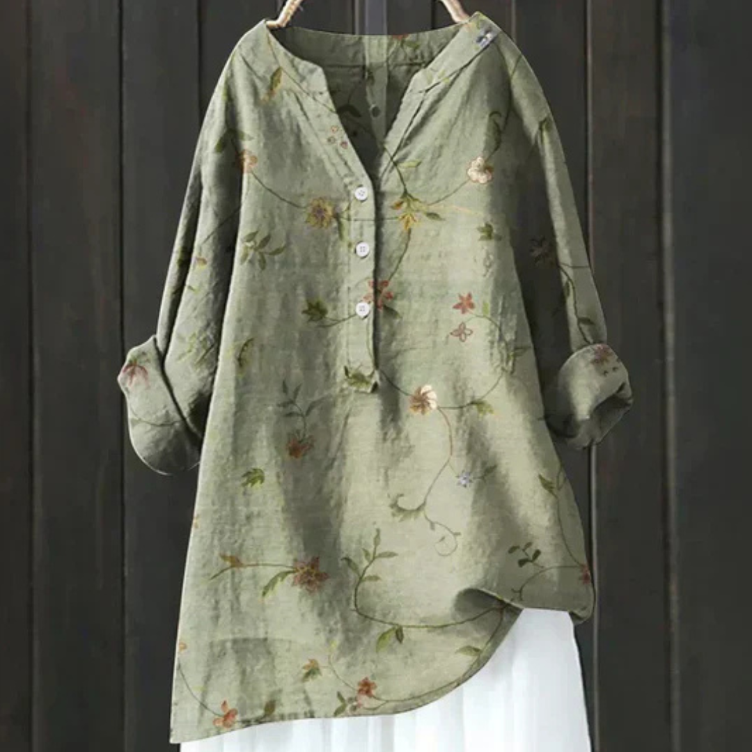 Stylish women's floral long sleeve top with V-neck, loose fit, and vibrant print. Ideal for spring casual wear.