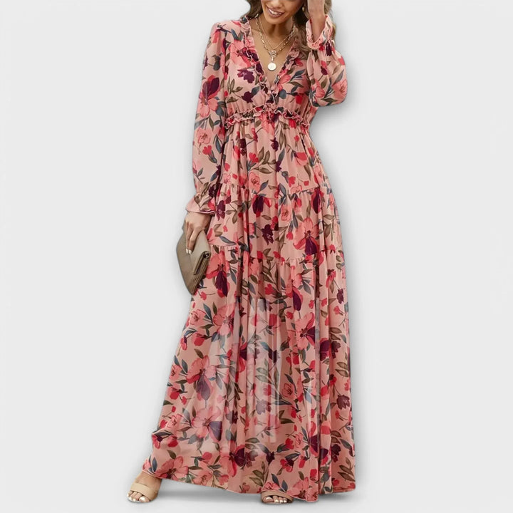 Women's floral maxi dress with ruffled V-neck & tiered skirt. Elegant spring/summer fashion & occasion wear.