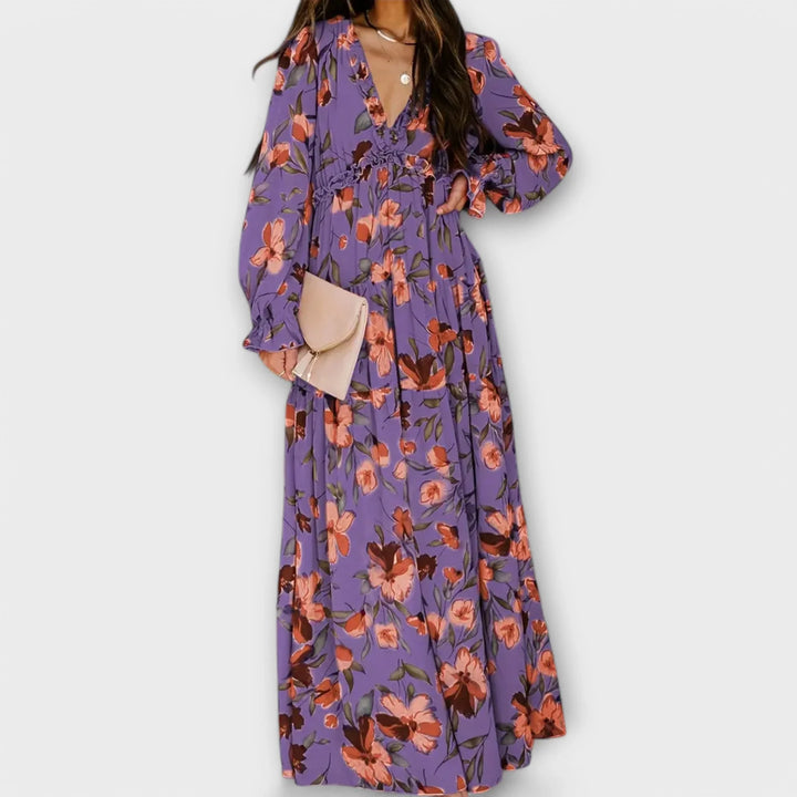 Chic floral print women's maxi dress featuring a ruffled V-neck and stylish tiered skirt. Summer elegant dress.