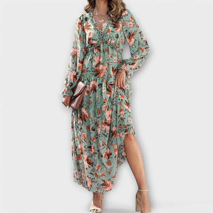 Elegant women's floral print maxi dress featuring ruffled V-neck & flowing tiered skirt. Perfect for day or evening.