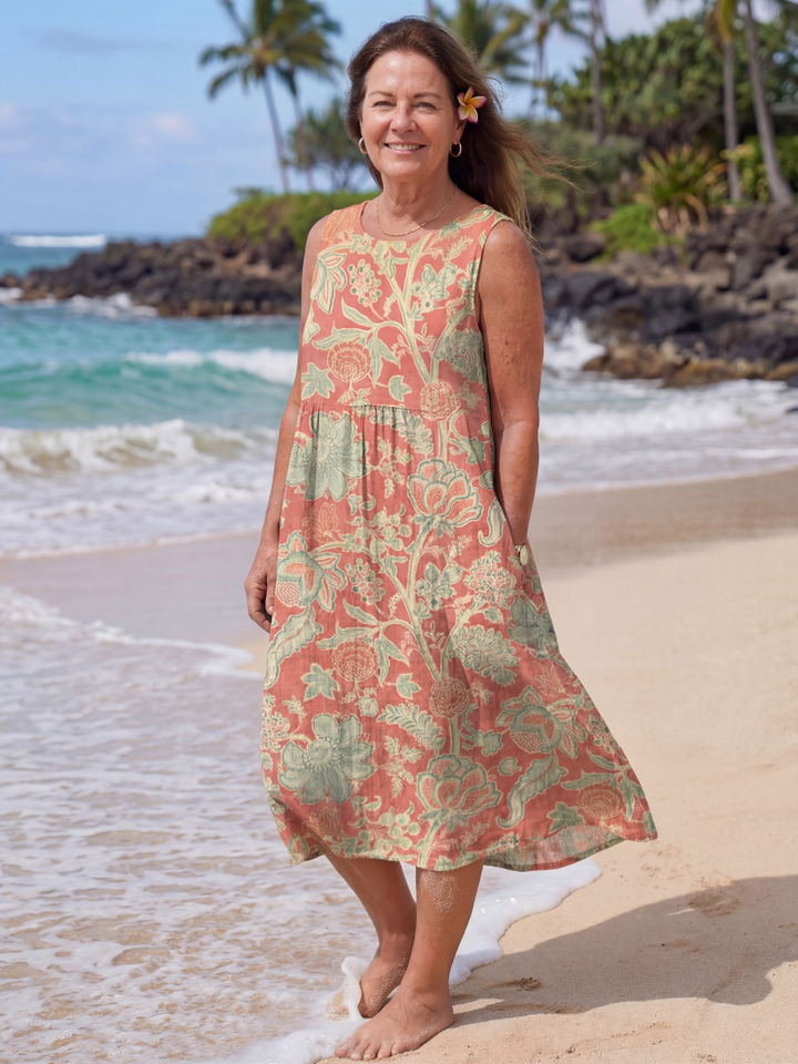 Women's floral midi beach dress with vibrant botanical print, perfect for summer vacation & resort wear.