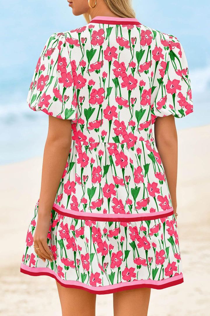 Women's trendy floral patchwork mini dress, puff sleeves & V-neck. Boho chic, comfortable summer casual wear.