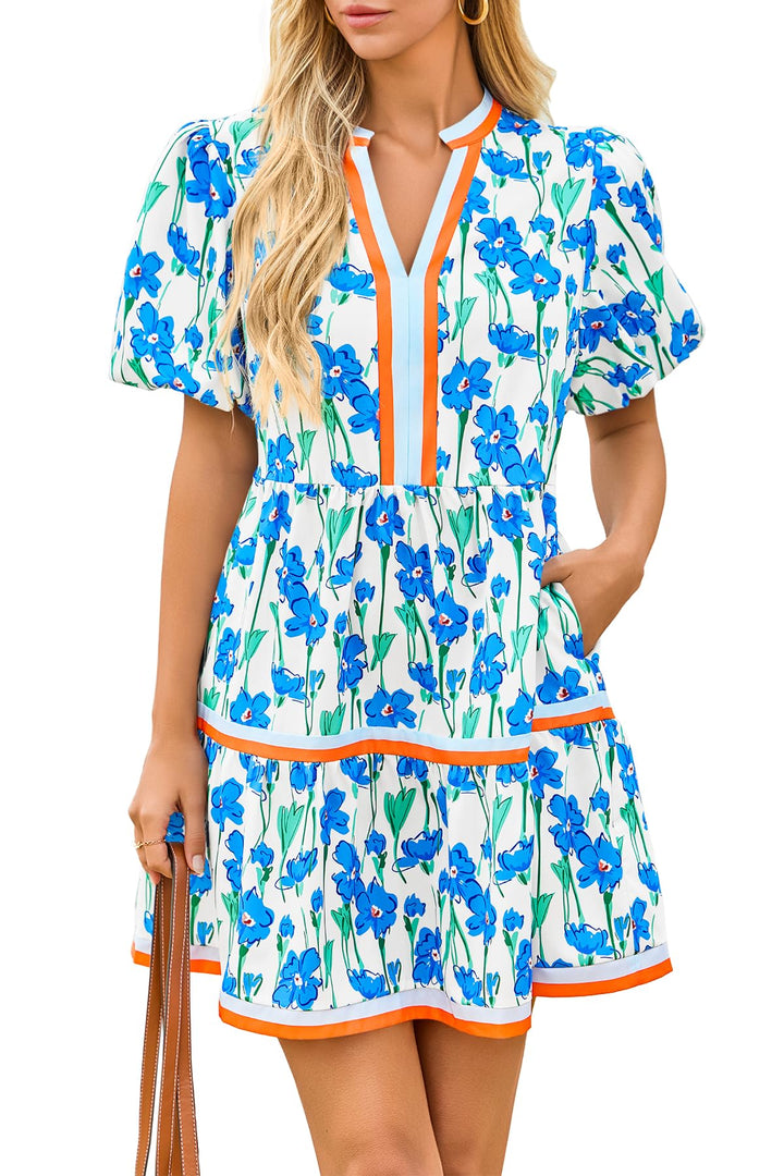 Stylish women's floral patchwork mini dress featuring puff sleeves & V-neck. Perfect for summer casual wear.