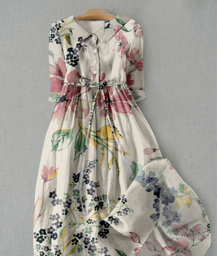 Versatile women's floral midi dress, a button-down design with a tie waist, suitable for elegant summer wear.