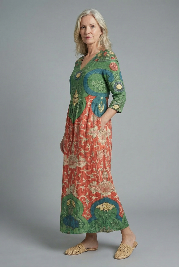 Boho-inspired women's maxi dress featuring a vibrant floral print and flattering A-line silhouette.