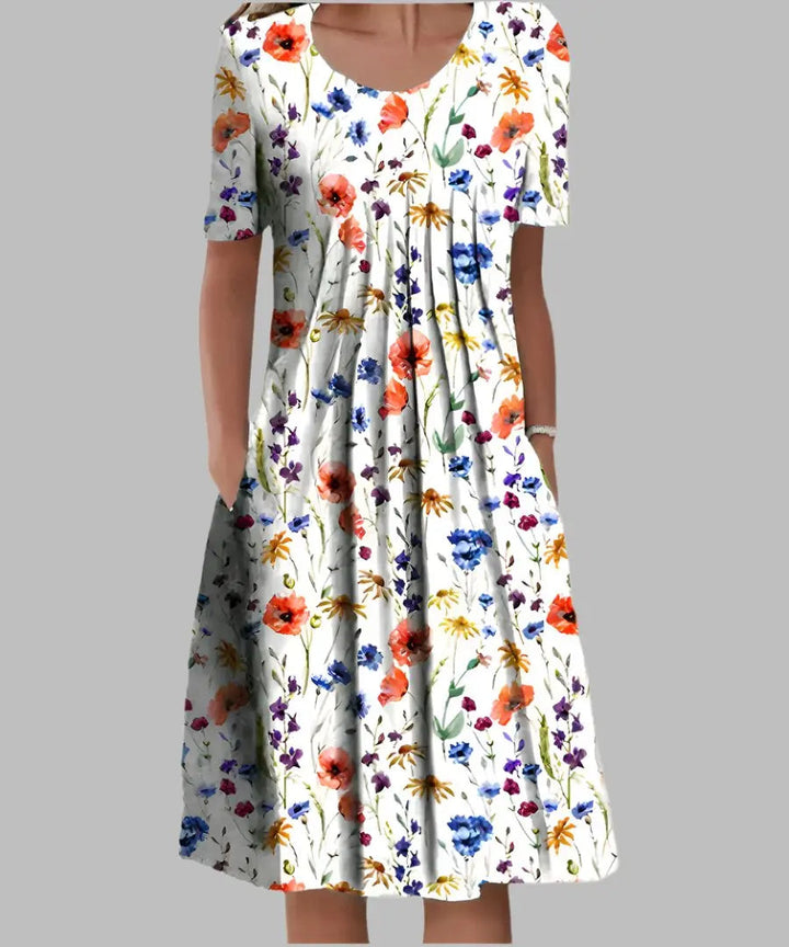 Women's floral print A-line midi dress with short sleeves, perfect for summer casual or elegant wear.