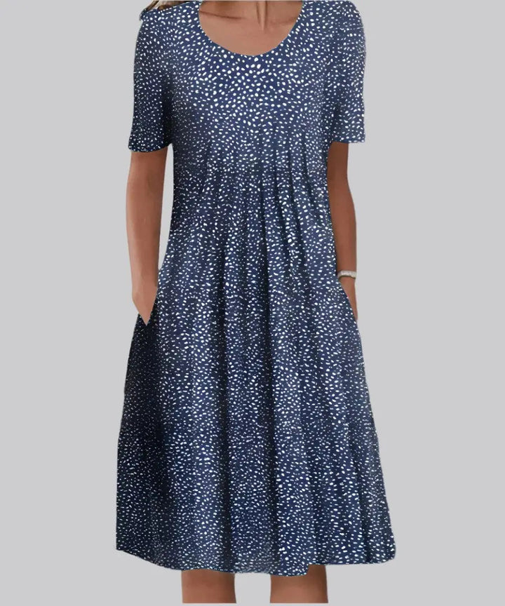 Versatile women's A-line midi dress with beautiful floral print & short sleeves for any summer occasion.