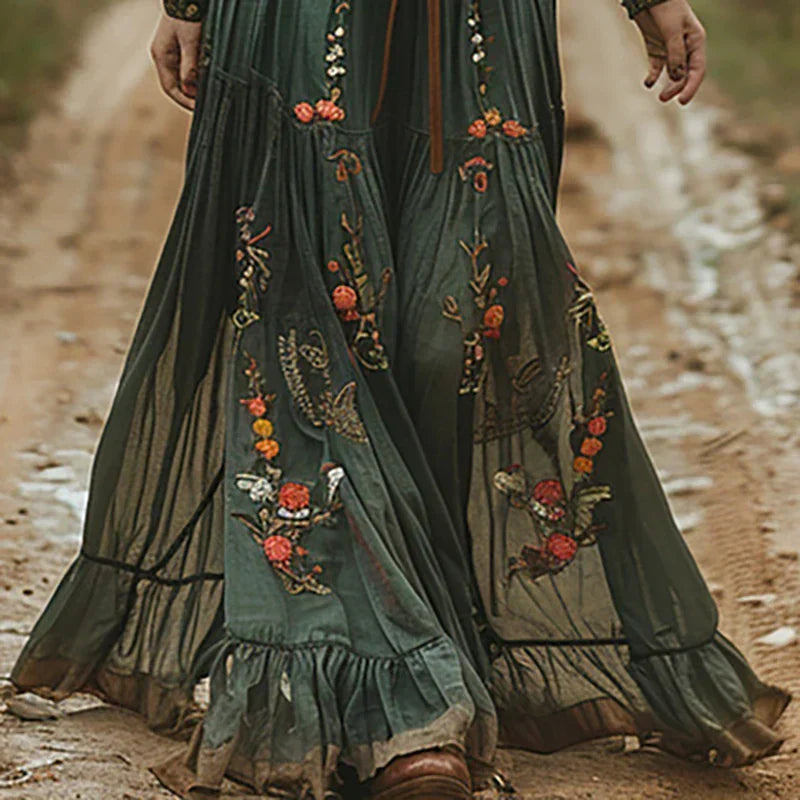Elegant women's floral print button-front maxi dress with long sleeves, ideal for autumn casual wear.