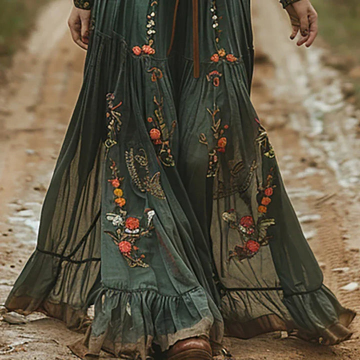 Elegant women's floral print button-front maxi dress with long sleeves, ideal for autumn casual wear.