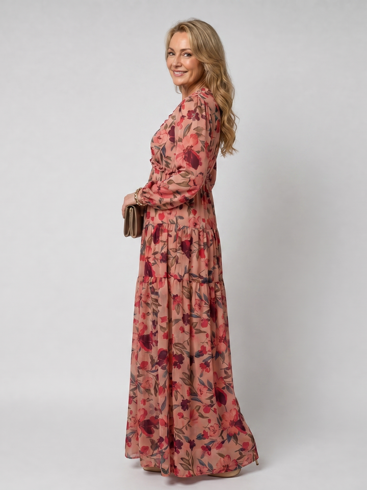 Elegant women's floral tiered maxi dress, perfect for spring/summer with long sleeves.