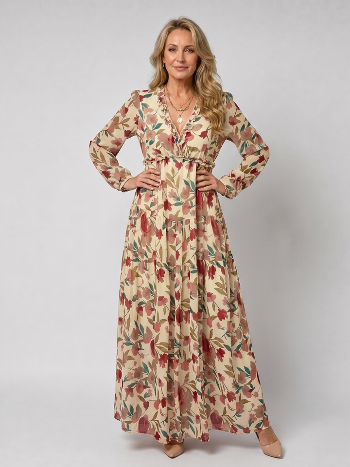 Women's long sleeve floral print tiered maxi dress, a relaxed fit for spring fashion.