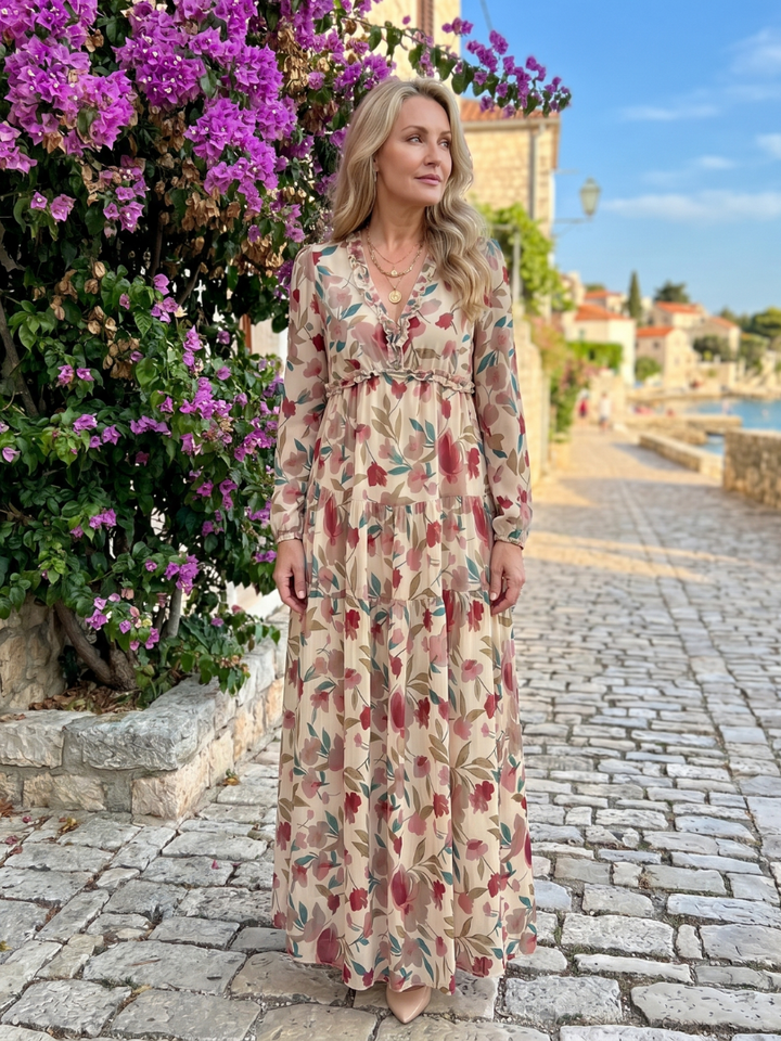 Vibrant floral print long sleeve tiered maxi dress for women, ideal for summer outfits.