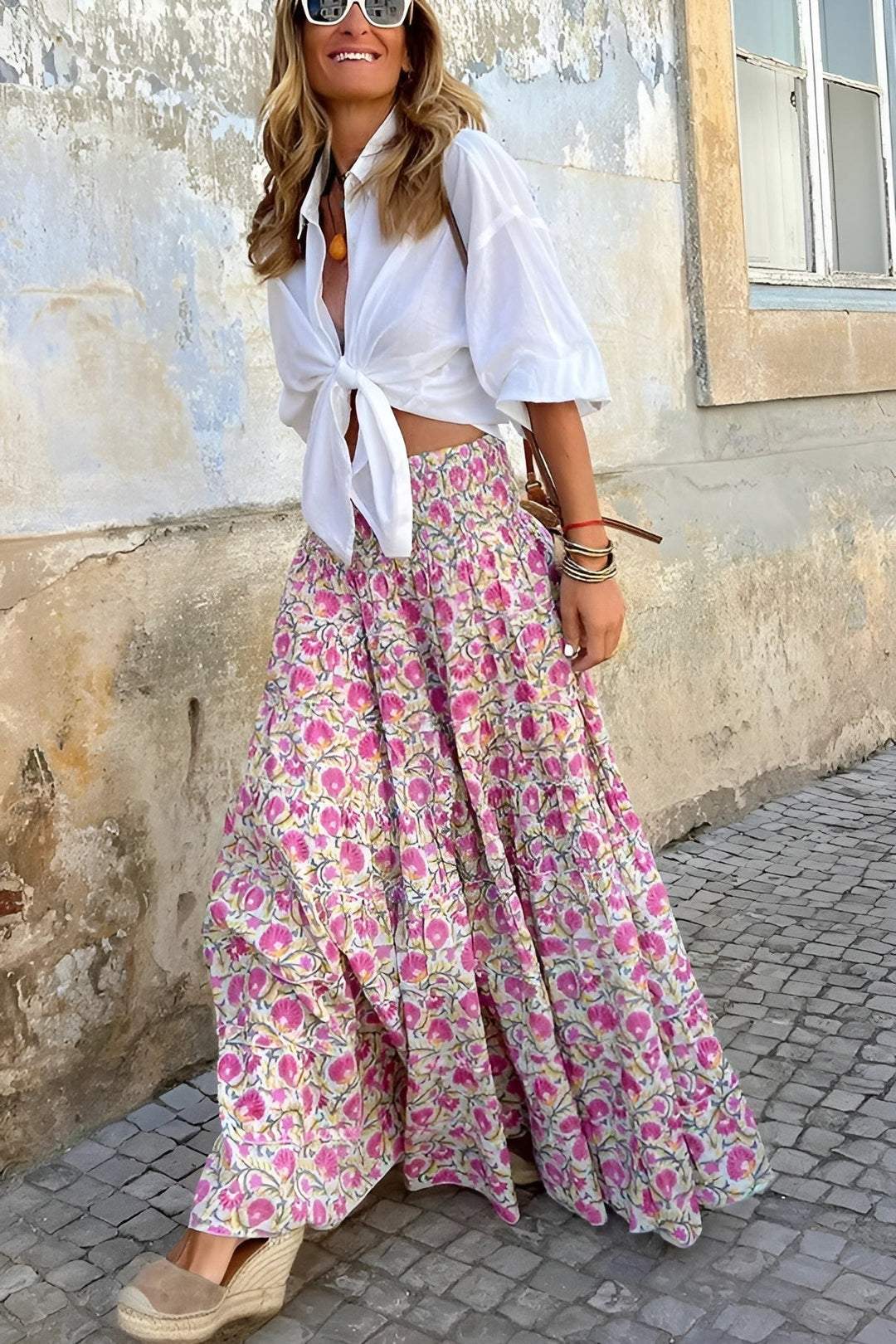 Casual women's floral print maxi skirt with smocked waist, great for effortless everyday summer style.