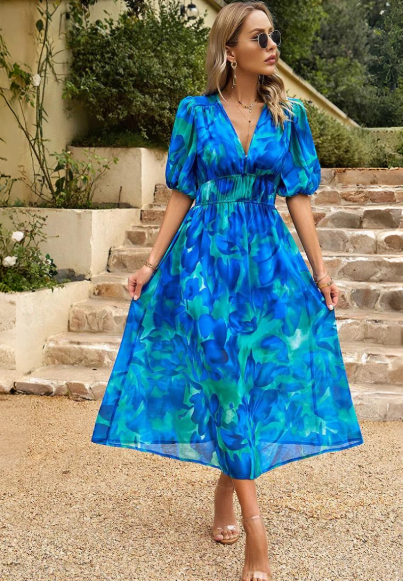Feminine spring fashion: floral print midi dress with V-neck and comfortable short sleeves.