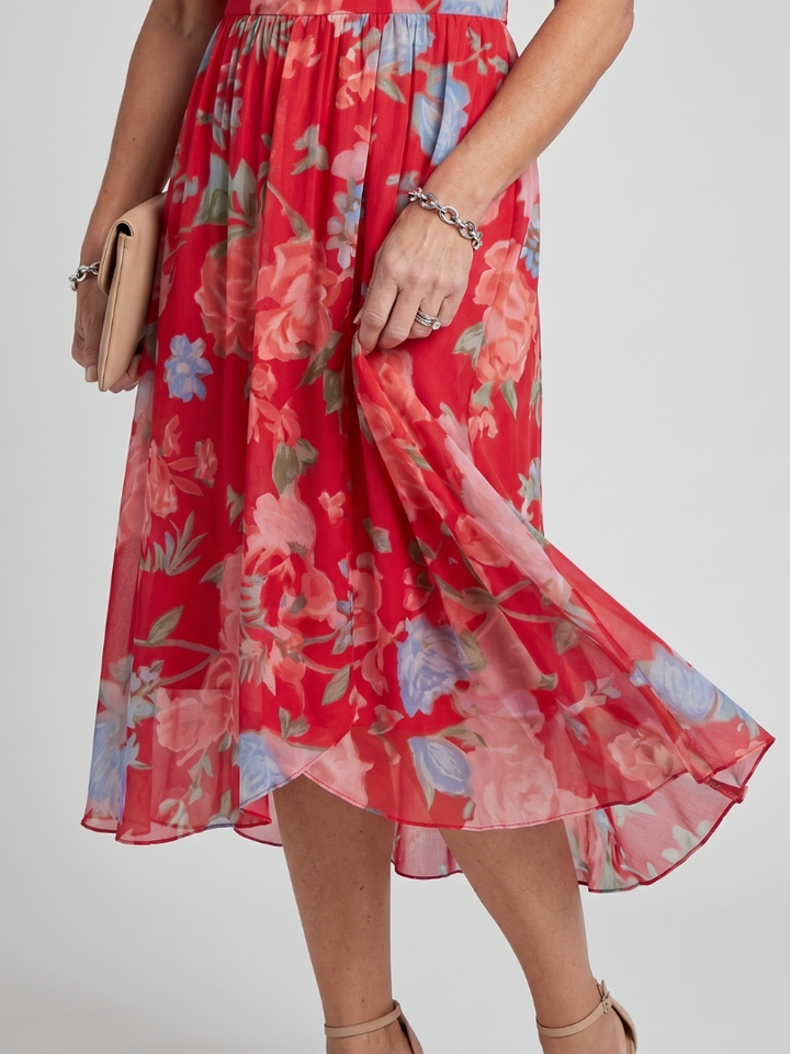Versatile women's floral midi dress with flutter sleeves, easily styled for casual or elegant events.