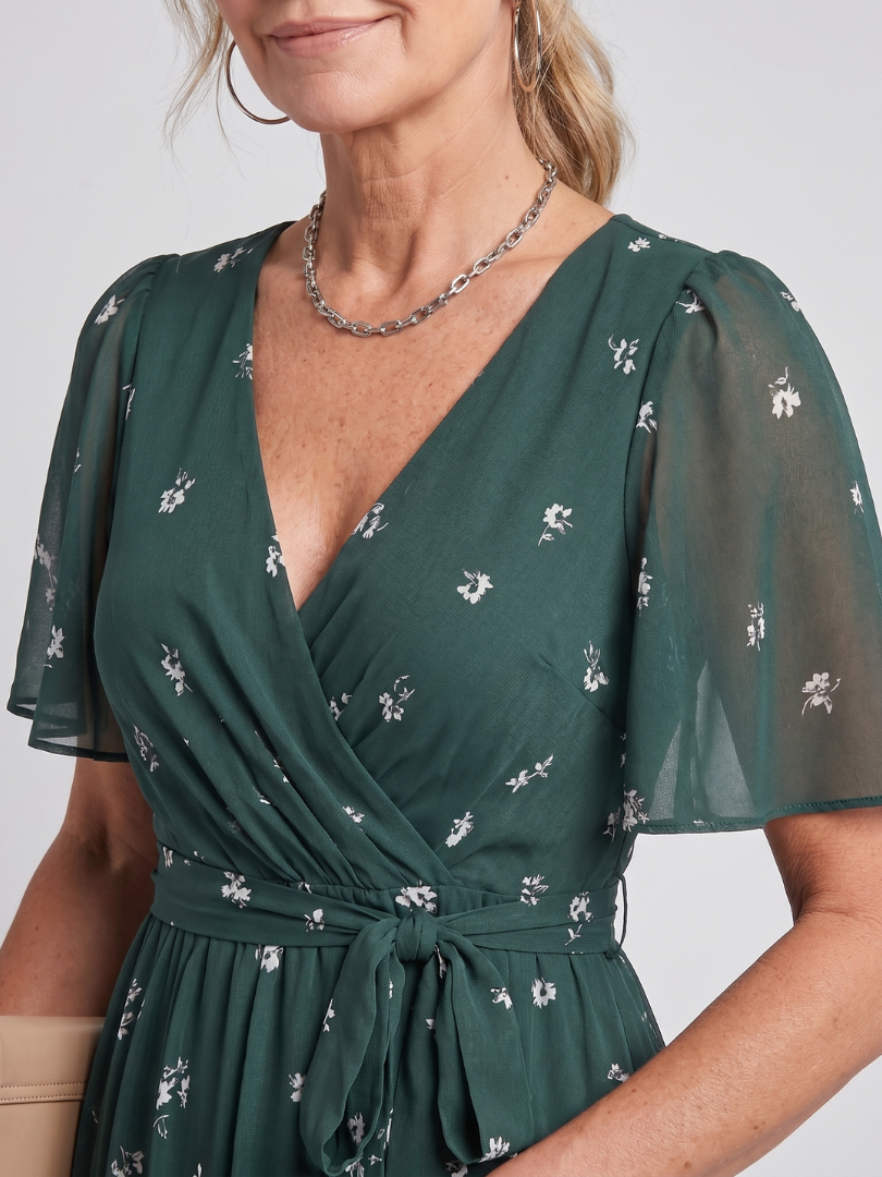 Perfect summer floral midi dress with delicate flutter sleeves, ideal for warm weather comfort.