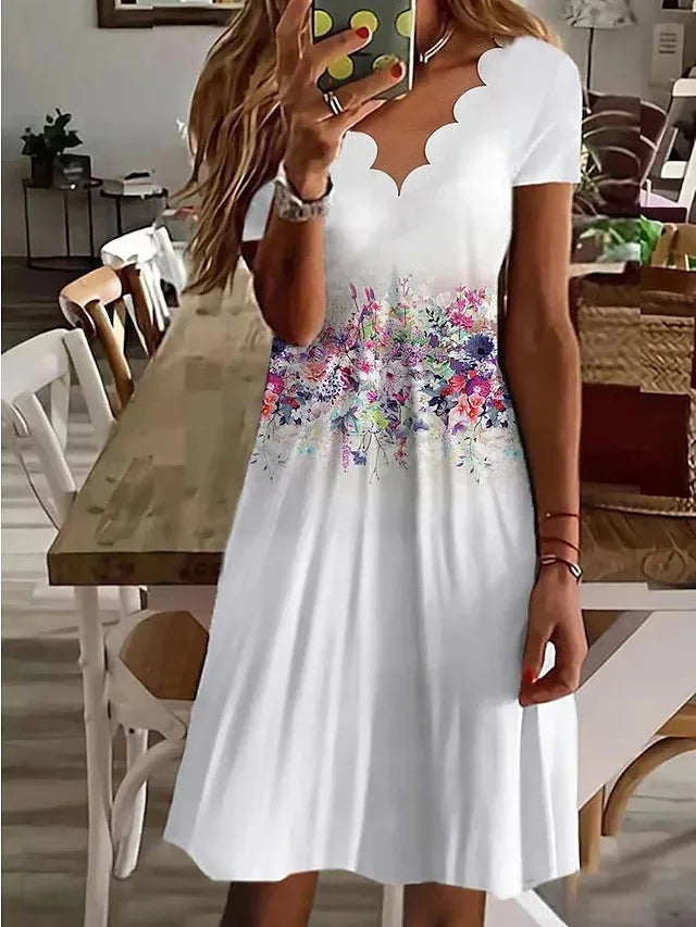 Stylish women's floral print flared midi dress. A chic choice for spring fashion and versatile everyday wear.