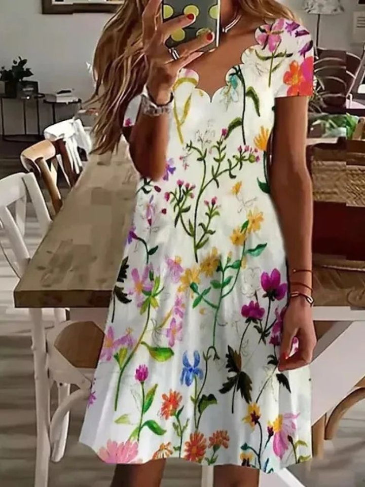 Versatile women's floral scalloped midi dress with a flared skirt, perfect for spring, autumn, or casual outings.