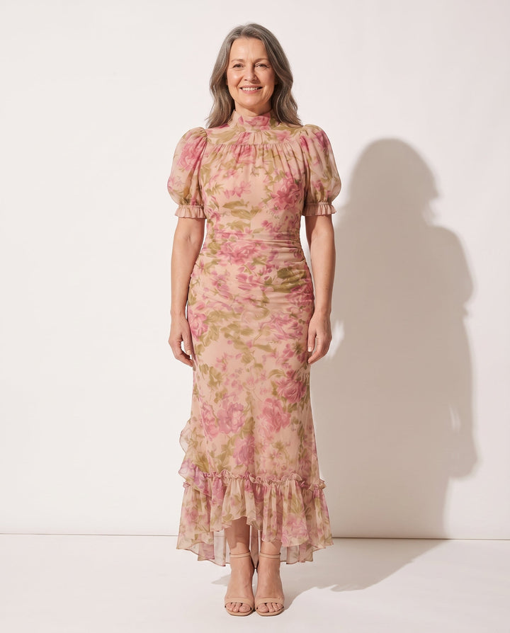 Women's floral print puff sleeve maxi dress with ruffle hem, ideal for summer garden parties & wedding guests.