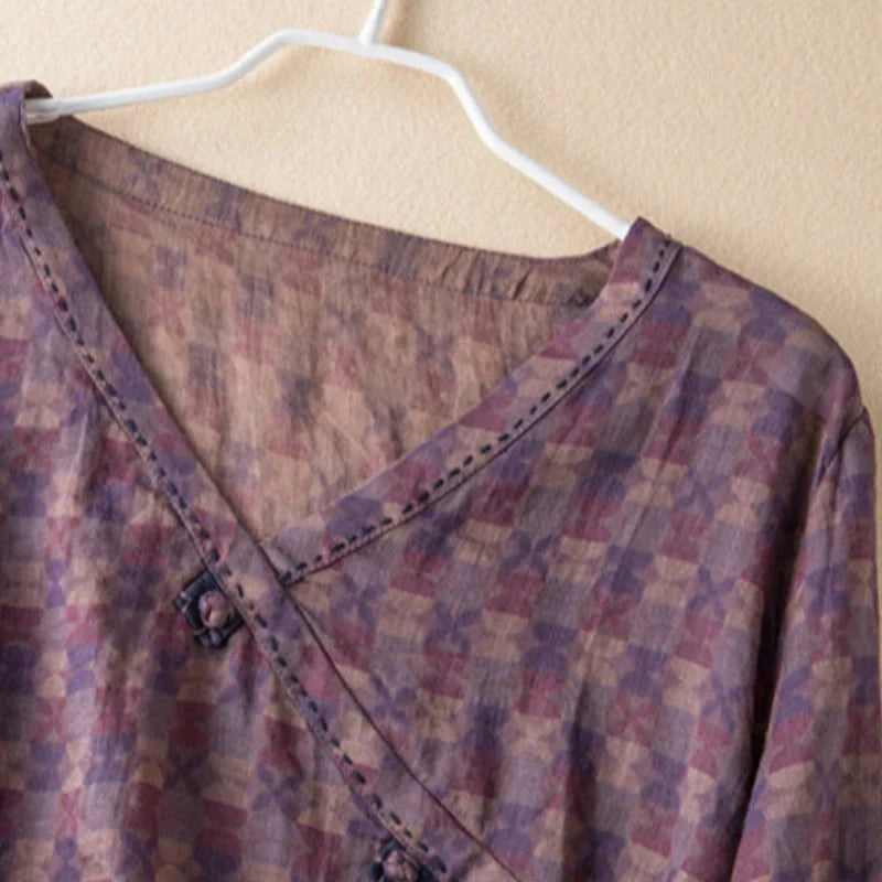 Comfortable women's floral print V-neck blouse with 3/4 sleeves, a versatile button-front top for everyday wear.