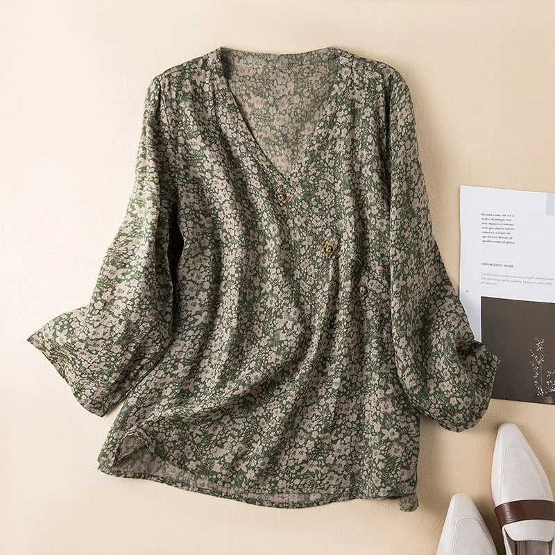Versatile women's floral print 3/4 sleeve shirt. A relaxed V-neck button-front blouse perfect for summer fashion.