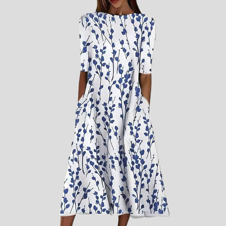 Elegant ladies' floral print midi dress, featuring a comfortable short sleeve and a graceful A-line swing design.