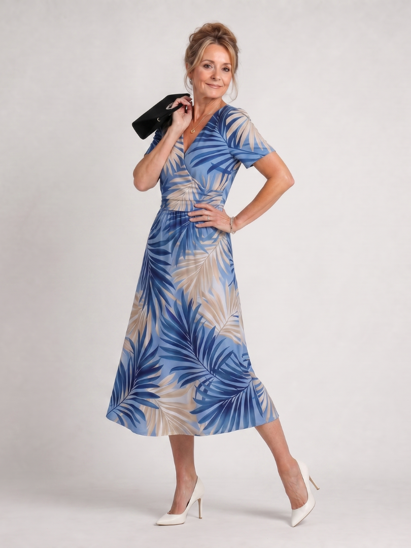 Comfortable women's short sleeve V-neck floral midi dress, perfect for relaxed summer fashion.