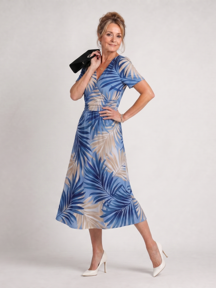 Comfortable women's short sleeve V-neck floral midi dress, perfect for relaxed summer fashion.