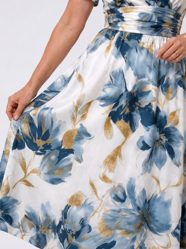Vibrant floral print short sleeve wrap midi dress for women, ideal as a casual yet feminine summer or spring dress.