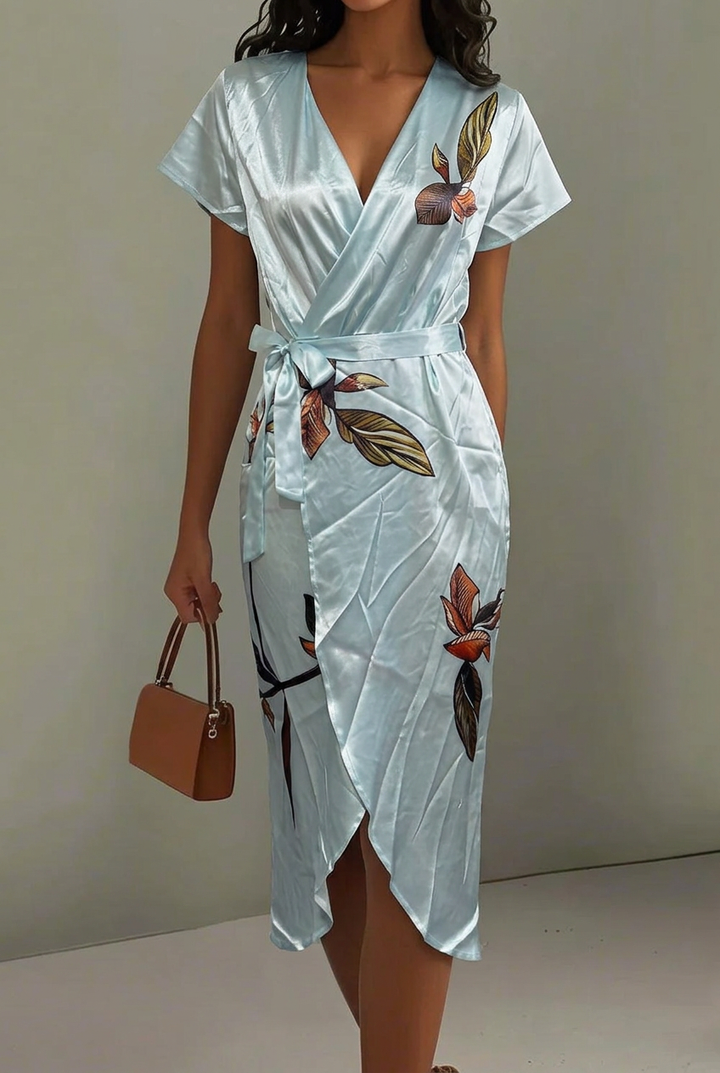 Trendy women's fashion midi wrap dress with a beautiful floral print, V-neck, and elegant flow.