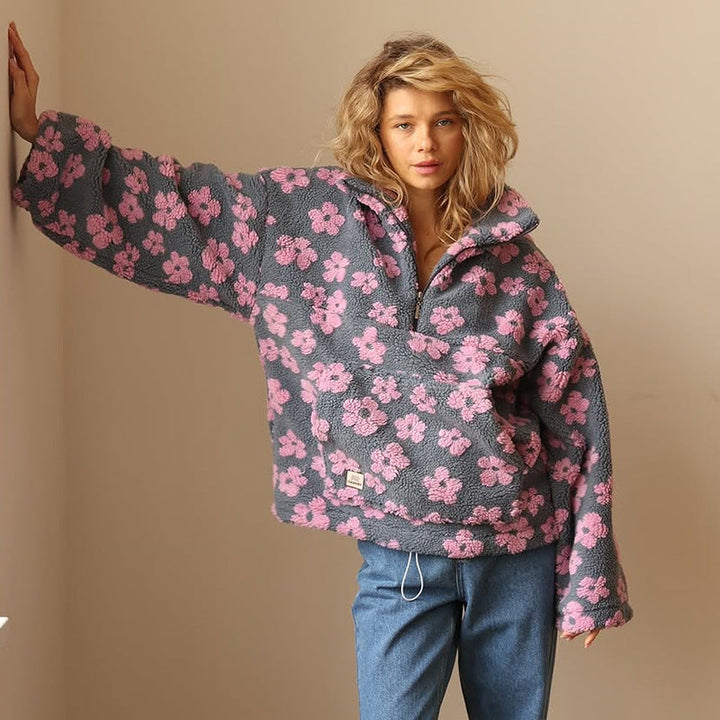 Versatile women's floral print quarter zip jumper for relaxed everyday comfort & casual style.