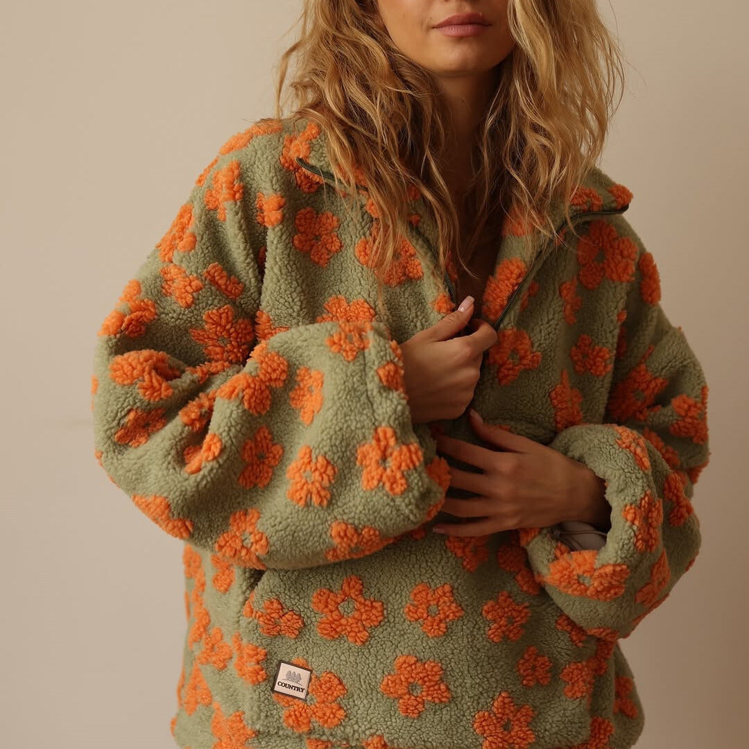 Women's fall fashion floral quarter zip sweater; relaxed fit, long sleeve pullover for cozy comfort.
