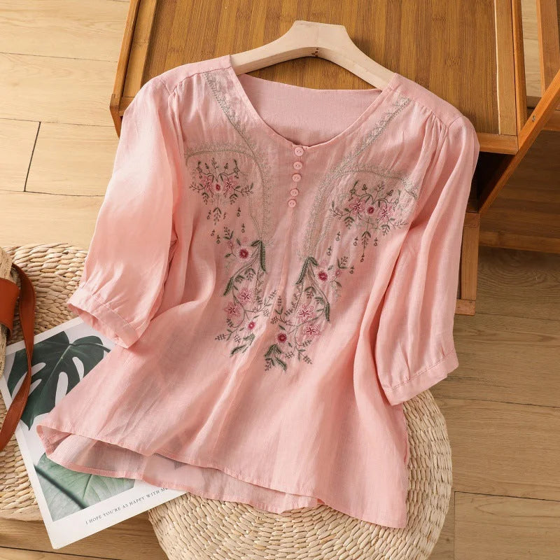 Elegant women's floral print V-neck blouse, relaxed fit, 3/4 sleeves. Perfect for summer casual fashion.