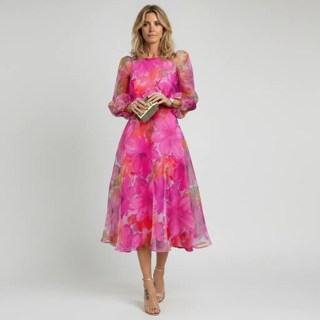 Women's floral sheer sleeve midi dress with elegant puff detail.