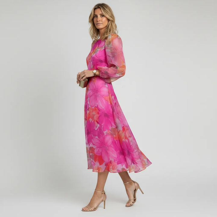 Elegant floral print midi dress for women with delicate sheer puff sleeves.