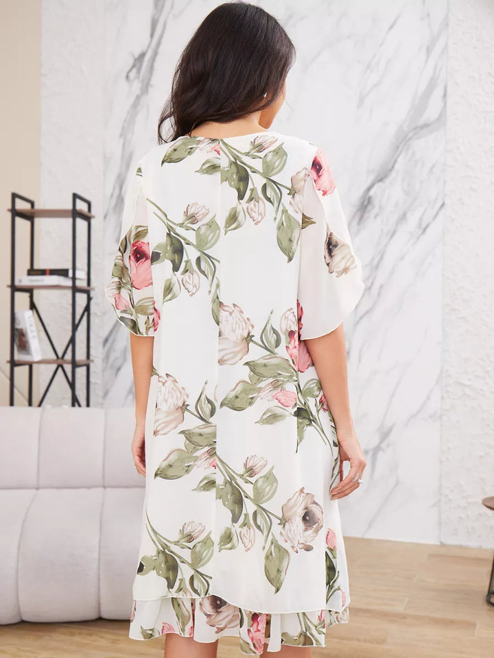 Stylish women's short sleeve floral dress with a playful ruffle hem, suitable for summer parties & casual outings.