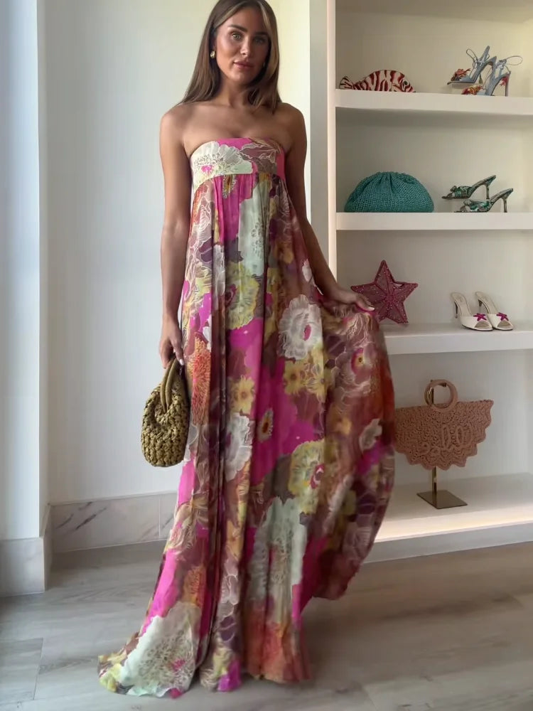 Elegant strapless floral maxi dress for women, perfect as a wedding guest or for summer parties.